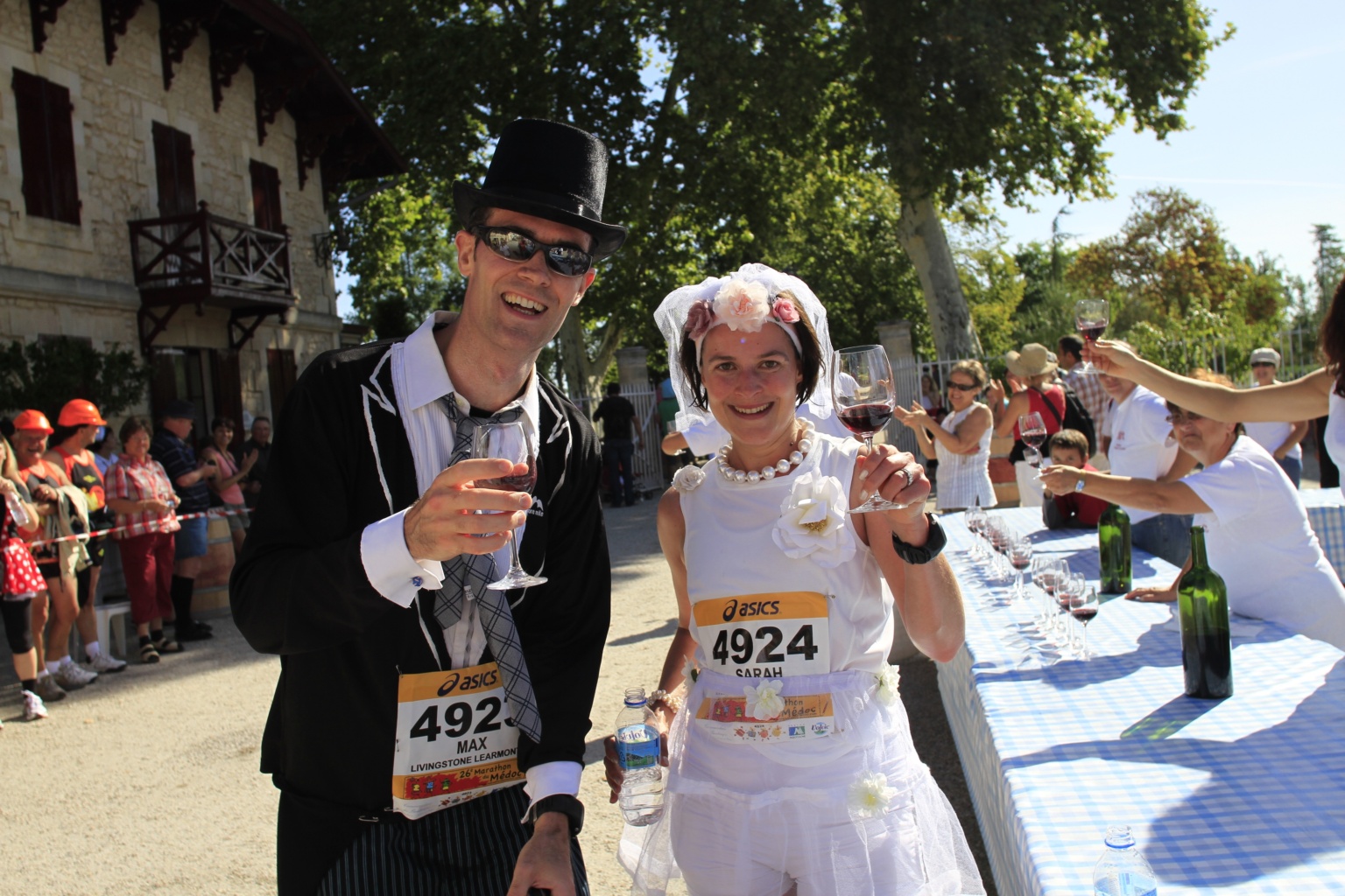 A Couple Drinking Red Wine At The Marathon Du Medoc